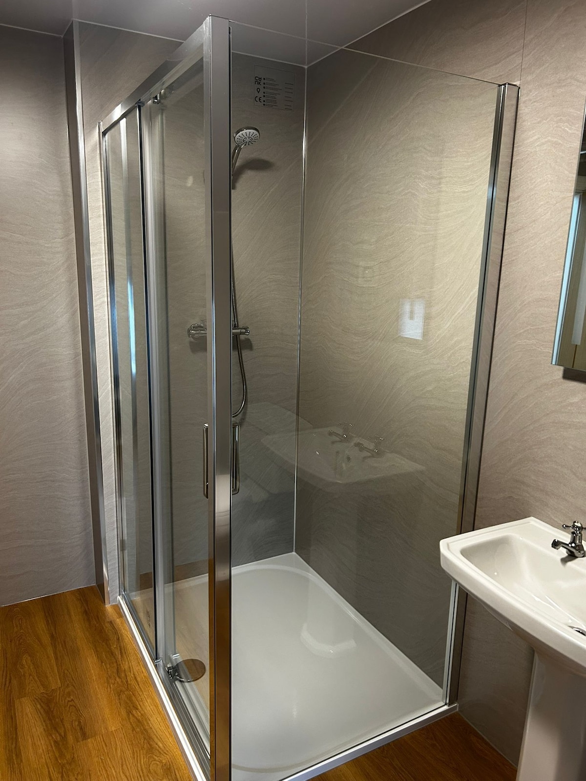 En-suite glass shower cubicle